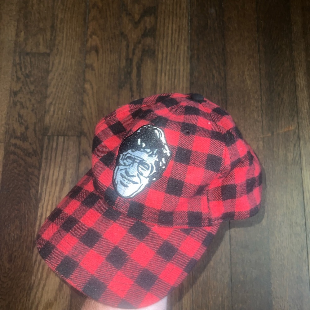 Red and Black Checkered Cap with Embroidered Face